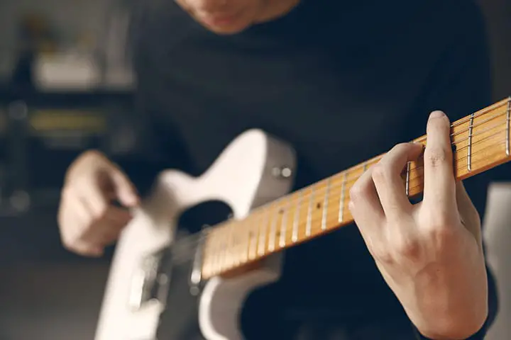 How to Play Electric Guitar Through Headphones